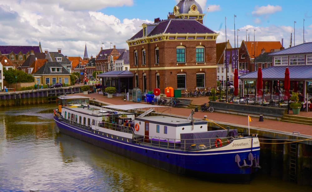 Ship Josefien moored in the harbour of a Frisian town