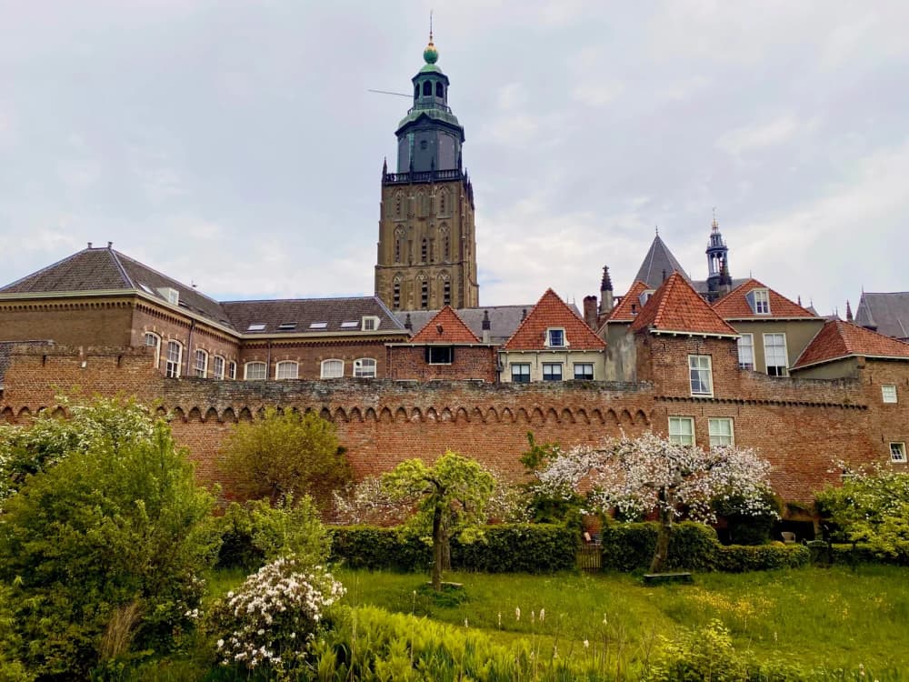 Medieval town walls and a church tower in a Hanseatic city
